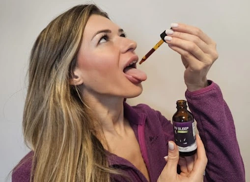 women taking yusleep with its dropper